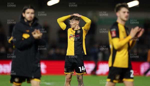 071225 - Boreham Wood v Newport County, Emirates FA Cup 2nd Round - Kai Whitmore of Newport County dejected at the end of the match