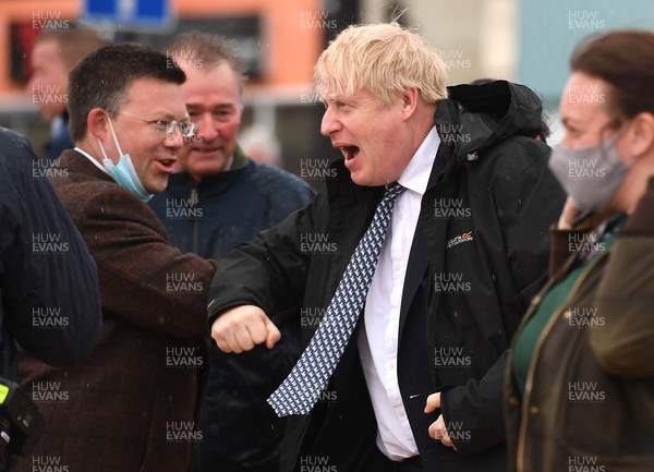 030521 -  Prime Minister Boris Johnson and Matt Smith, Welsh Conservative candidate for the Vale of Glamorgan during a visit to Marco's Cafe at Barry Island, South Wales as the final week of campaigning for the Senedd elections gets under way