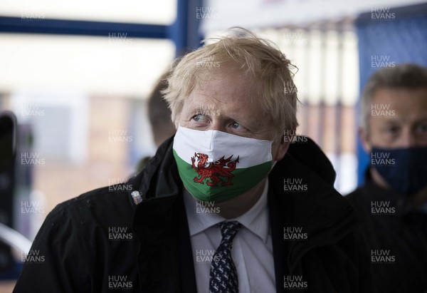 030521 - Picture shows Prime Minister Boris Johnson visiting Marco’s cafe in Barry Island, South Wales on Bank Holiday Monday