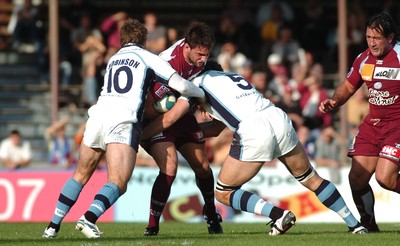 21.10.06 - Bourgoin v Cardiff Blues - Bourgoin's Damien Fevre is sandwiched by Nicky Robinson(lt) and Robert Sidoli 