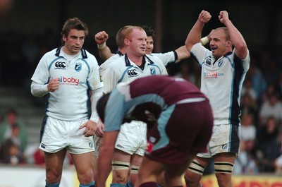 21.10.06 - Bourgoin v Cardiff Blues - (L - R)Blues Nicky Robinson, Martyn Williams and Mark Lewis celebrate victory 