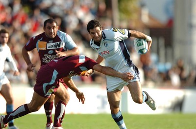 21.10.06  Bourgoin v Cardiff Blues  Mike Phillips is tackled by Benjamin Boyet  