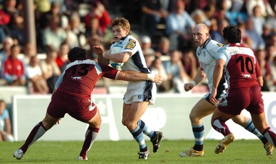 21.10.06  Bourgoin v Cardiff Blues  Ben Blair is tackled by Guillaume Bousses  