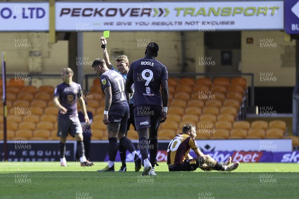 130822 - Bradford City v Newport County - Sky Bet League 2 - Referee Will Finnie shows the yellow card to Scott Bennett of Newport