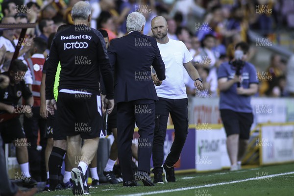 130822 - Bradford City v Newport County - Sky Bet League 2 - James Rowberry of Newport shakes hands with Mark Hughes of Bradford at Full Time 