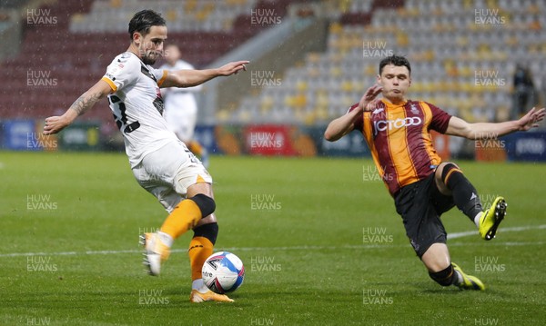 241020 - Bradford City v Newport County - Sky Bet League 2 - Liam Shephard of Newport County takes a shot on goal but is blocked by Connor Wood of Bradford City