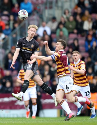 270424 - Bradford City v Newport County - Sky Bet League 2 - Harry Charsley of Newport County and Ash Taylor of Bradford City