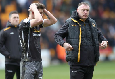 270424 - Bradford City v Newport County - Sky Bet League 2 - Dejected Newport manager Graham Coughlan at the end of the match with Seb Palmer Houlden