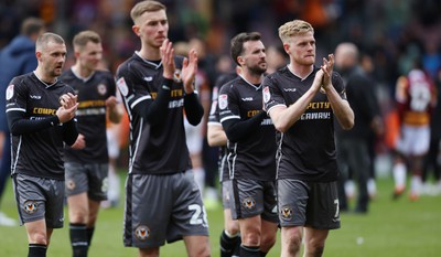 270424 - Bradford City v Newport County - Sky Bet League 2 - team led by Will Evans applaud the travelling fans