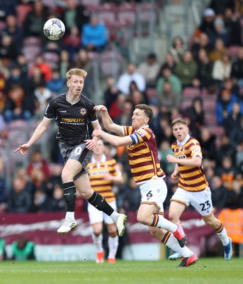 270424 - Bradford City v Newport County - Sky Bet League 2 - Harry Charsley of Newport County and Ash Taylor of Bradford City