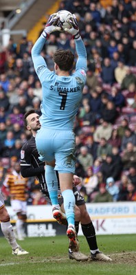 270424 - Bradford City v Newport County - Sky Bet League 2 - Goalkeeper Sam Walker of Bradford City save from Aaron Wildig of Newport County