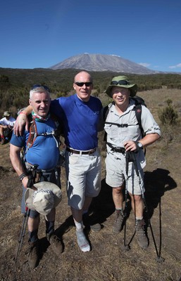 10.09.10.. Captains Climb of Kilimanjaro. Climb Day 2- Paul Thorburn, Scott Gibbs and Andy Thomas in front of their ultimate destination,the top of Kilimanjaro 