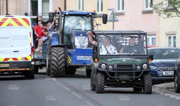 290419 - Brecon RFC Parade around the town on the back of a tractor to celebrate their victory in the WRU National Plate - Picture shows Head Coach Andy Powell in the passengers seat of the buggy leading the tractor around town