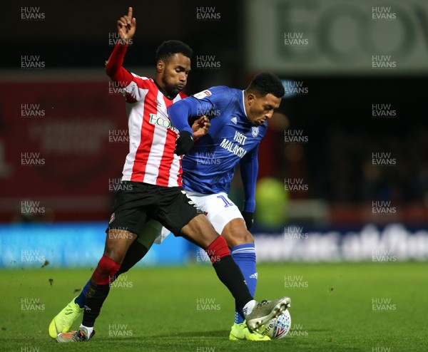 111219 - Brentford v Cardiff City, Sky Bet Championship - Nathaniel Mendez-Laing of Cardiff City and Rico Henry of Brentford compete for the ball