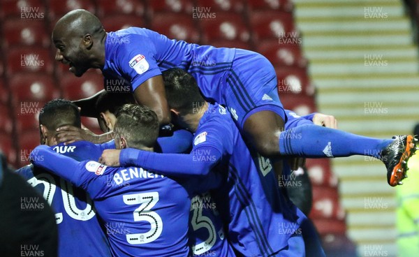 130318 - Brentford v Cardiff City, Sky Bet Championship - Cardiff payers celebrate with Kenneth Zohore of Cardiff City after scoring the third goal