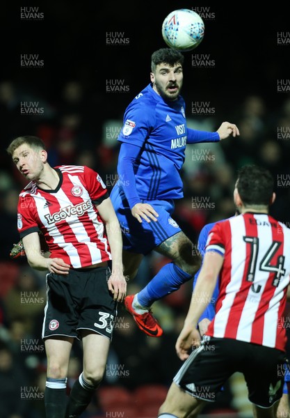 130318 - Brentford v Cardiff City, Sky Bet Championship - Callum Paterson of Cardiff City heads at goal