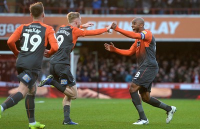 081218 - Brentford v Swansea City - SkyBet Championship - Leroy Fer of Swansea City celebrates scoring goal with Oliver McBurnie (left)