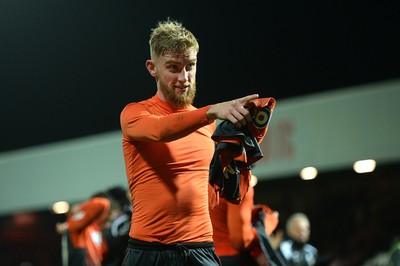 081218 - Brentford v Swansea City - SkyBet Championship - Oliver McBurnie of Swansea City gives his shirt to a fan at the end of the game