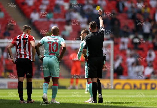 290521 - Brentford v Swansea City - SkyBet Championship Play off Final - Matt Grimes of Swansea City is shown a yellow card