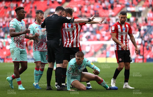 290521 - Brentford v Swansea City - SkyBet Championship Play off Final - Jay Fulton of Swansea City is shown a red card for his tackle on Mathias Jensen of Brentford
