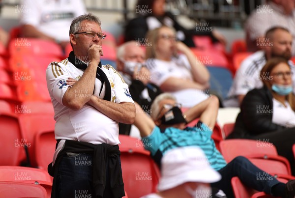 290521 - Brentford v Swansea City - SkyBet Championship Play off Final - Swansea City fans look dejected