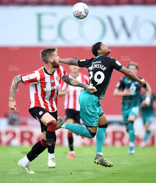 290720 - Brentford v Swansea City - EFL SkyBet Championship Play-Off - Pontus Jansson of Brentford and Rhian Brewster of Swansea City compete