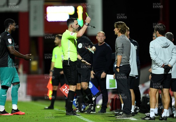 290720 - Brentford v Swansea City - EFL SkyBet Championship Play-Off - Brentford Manager Thomas Frank is shown a yellow card after a clash with Connor Roberts of Swansea City