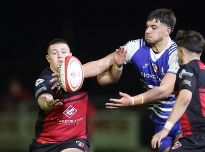 250925 - Bridgend Ravens RFC v Aberavon RFC, Super Rygbi Cymru - Dylan Burrows of Bridgend and Dylan James of Aberavon compete for the ball