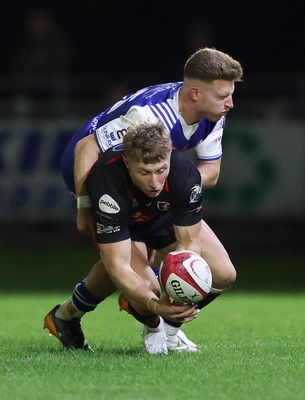 250925 - Bridgend Ravens RFC v Aberavon RFC, Super Rygbi Cymru - Frankie Jones of Aberavon and Lloyd Wilkins of Bridgend compete for the ball