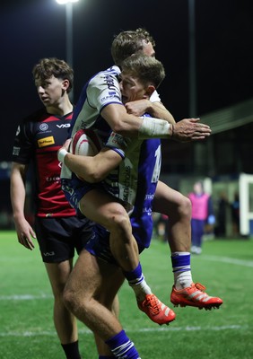 250925 - Bridgend Ravens RFC v Aberavon RFC, Super Rygbi Cymru - Mccauley Rowley of Bridgend and Harvey Nash of Bridgend celebrate after Rowley scores try