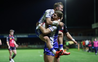 250925 - Bridgend Ravens RFC v Aberavon RFC, Super Rygbi Cymru - Mccauley Rowley of Bridgend and Harvey Nash of Bridgend celebrate after Rowley scores try