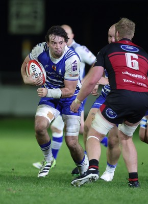 250925 - Bridgend Ravens RFC v Aberavon RFC, Super Rygbi Cymru - Benji Williams of Bridgend takes on Rhys Thomas of Aberavon