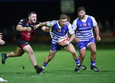 250925 - Bridgend Ravens RFC v Aberavon RFC, Super Rygbi Cymru - Lloyd Wilkins of Bridgend is tackled
