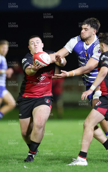 250925 - Bridgend Ravens RFC v Aberavon RFC, Super Rygbi Cymru - Dylan Burrows of Bridgend and Dylan James of Aberavon compete for the ball