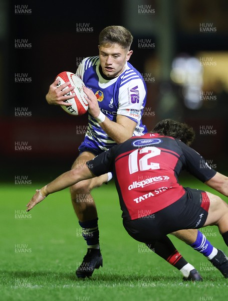 250925 - Bridgend Ravens RFC v Aberavon RFC, Super Rygbi Cymru - Mccauley Rowley of Bridgend takes on Joe Gage of Aberavon