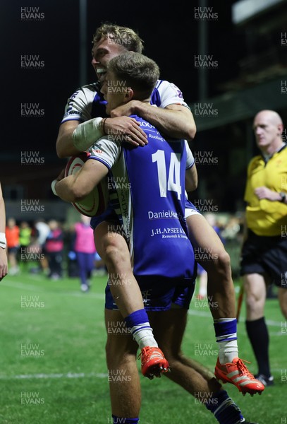 250925 - Bridgend Ravens RFC v Aberavon RFC, Super Rygbi Cymru - Mccauley Rowley of Bridgend and Harvey Nash of Bridgend celebrate after Rowley scores try