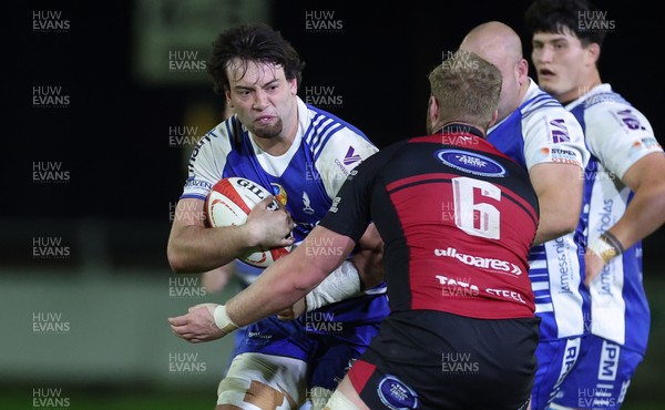 250925 - Bridgend Ravens RFC v Aberavon RFC, Super Rygbi Cymru - Benji Williams of Bridgend takes on Rhys Thomas of Aberavon