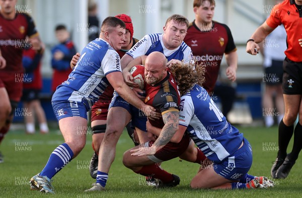 081125 - Bridgend Ravens v RGC - Super Rygbi Cymru - Delwyn Jones of RGC is tackled by Ben Burnell of Bridgend 