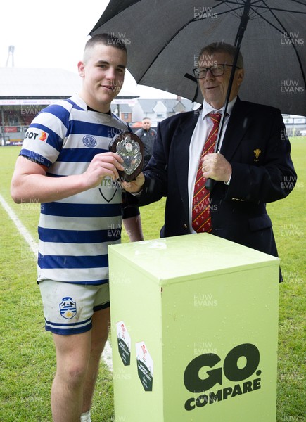 020526 - Bridgend Sports v Lampeter Town, U18s Boys Club Shield Final - Bridgend Sports captain Hari Coulthard  receives the trophy from Chris Jones, WRU Board Member, after winning the  U18s Boys Club Shield Final