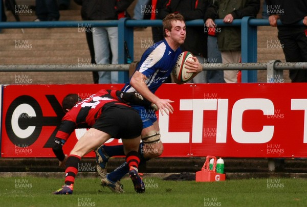 031112 Bridgend RFC v Aberavon RFC - Principality Premiership -Bridgend's Shaun O'Rourke takes on Aberavon's Richard Carter 