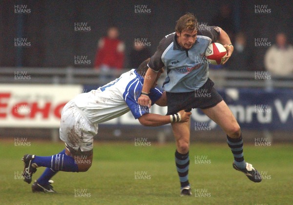 160503 - Bridgend v Cardiff - Welsh Premiership - Cardiff's Nicky Robinson is tackled by Josh Taumalolo