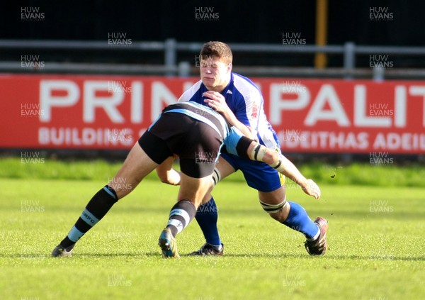 201012 Bridgend RFC Cardiff RFC - British and Irish Cup -Bridgend's Andrew Waite is tackled by Cardiff's Cory Allen