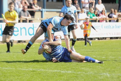 050425 - Bridgend v Cardiff RFC - Super Rygbi Cymru (SRC) - Cameron Ellis of Bridgend Ravens is tackled short of the tryline by Harri Wilde and Tom Bowen(hidden) of Cardiff