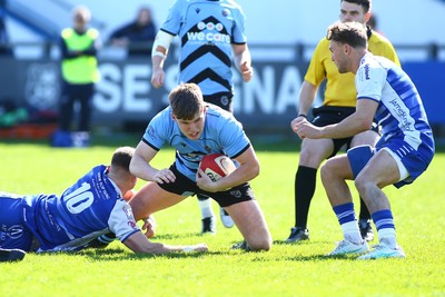050425 - Bridgend v Cardiff RFC - Super Rygbi Cymru (SRC) - Steffan Emanuel of Cardiff is tackled by Lloyd Wilkins of Bridgend Ravens