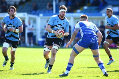 050425 - Bridgend v Cardiff RFC - Super Rygbi Cymru (SRC) - Sean Moore of Cardiff takes on Kyle Harris of Bridgend Ravens