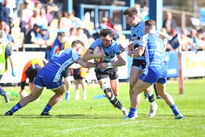 050425 - Bridgend v Cardiff RFC - Super Rygbi Cymru (SRC) - Joe Goodchild of Cardiff is tackled by McCauley Rowley of Bridgend Ravens