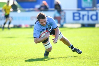 050425 - Bridgend v Cardiff RFC - Super Rygbi Cymru (SRC) - Aled Ward of Cardiff bursts through the Bridgend Ravens defence to score a try