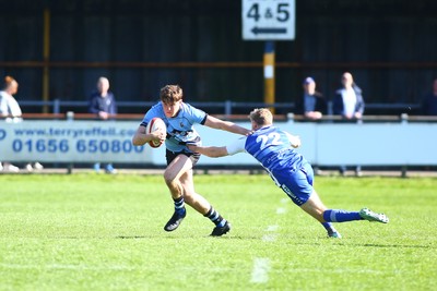 050425 - Bridgend v Cardiff RFC - Super Rygbi Cymru (SRC) - Matty Young of Cardiff brushes off Coum Nott of Bridgend Ravens