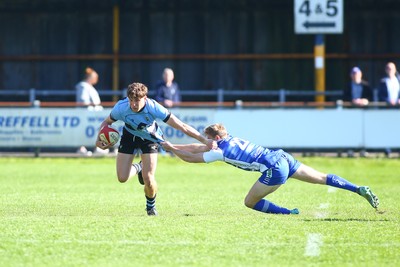 050425 - Bridgend v Cardiff RFC - Super Rygbi Cymru (SRC) - Matty Young of Cardiff brushes off Coum Nott of Bridgend Ravens