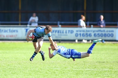 050425 - Bridgend v Cardiff RFC - Super Rygbi Cymru (SRC) - Matty Young of Cardiff brushes off Coum Nott of Bridgend Ravens